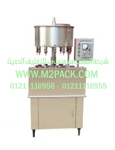 ماكينة تغليف عبوات زجاجية بلاستيك