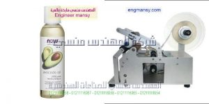 ماكينة لصق استيكر ليبل نصف أتوماتيك علي عبوات الكحل الإثيلي و المنتجات الطبية ماركة ام تو باك